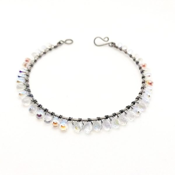 Titanium bracelet with glass beads